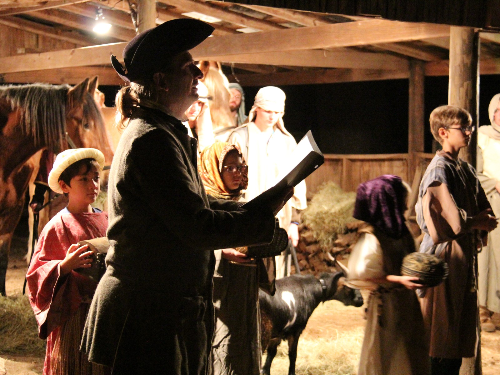 Family-Yuletide-Nativity-Scene-and-Reading